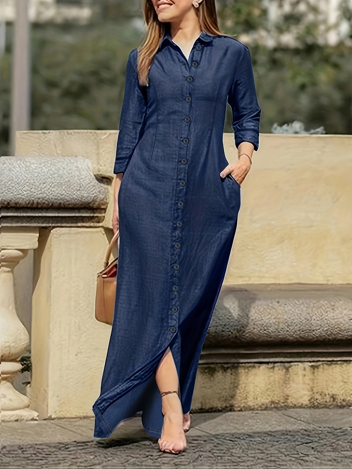 Solid maxi dress with button front, long sleeve and collar.