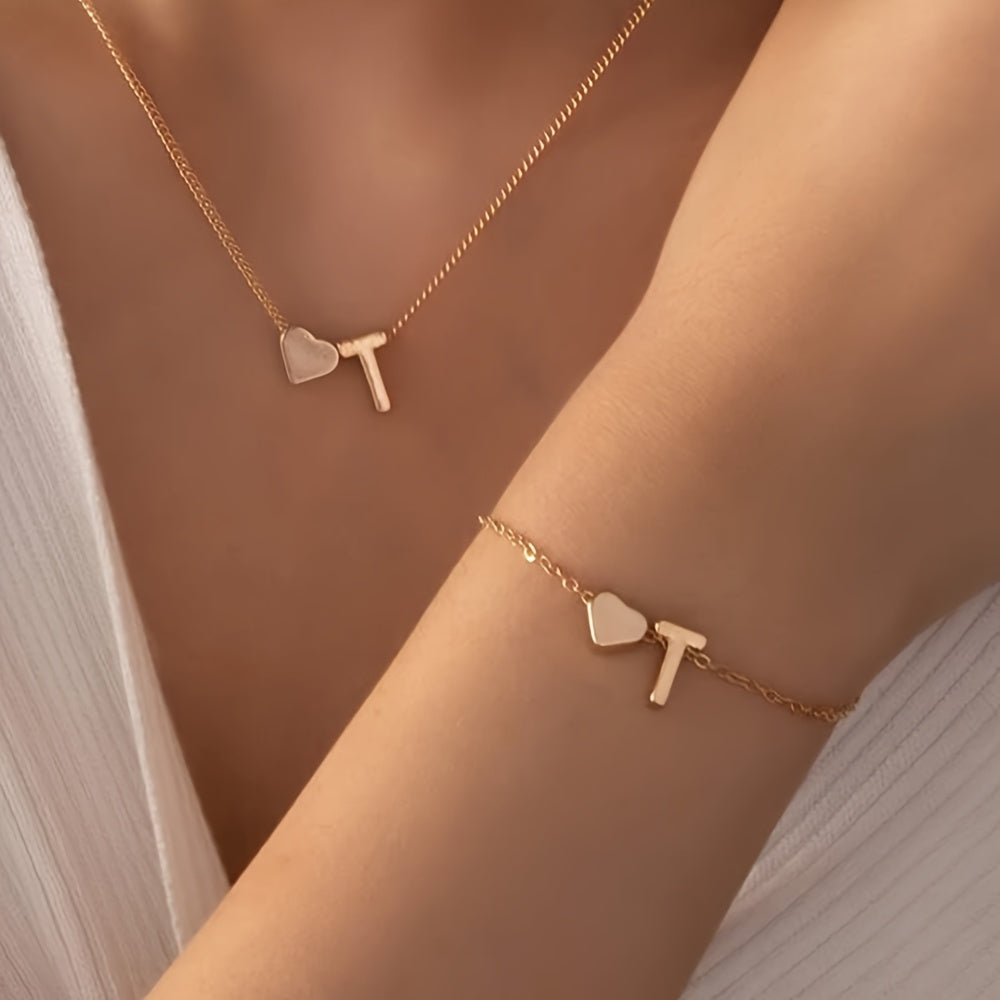 Chic two-piece set with metal heart and letter necklace and bracelet, ideal for daily wear.