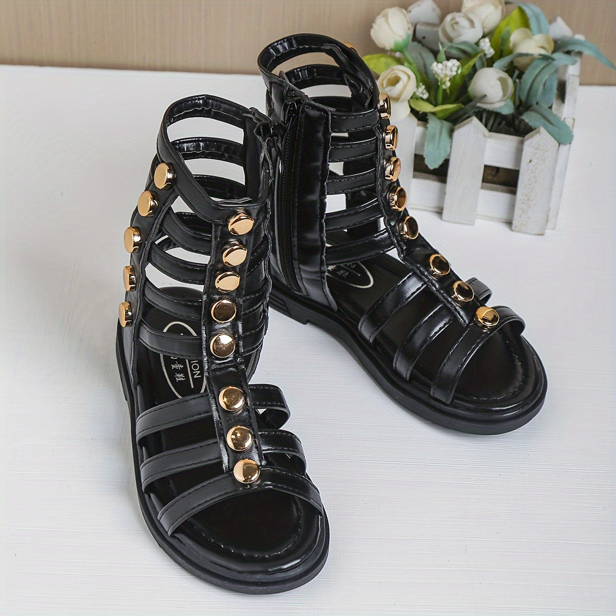 1 Pair of Fashion Rivet Buckle Sandals with Geometric Pattern, Back Zipper, Synthetic Faux Leather Upper and Rubber Sole for Spring/Summer Wear.