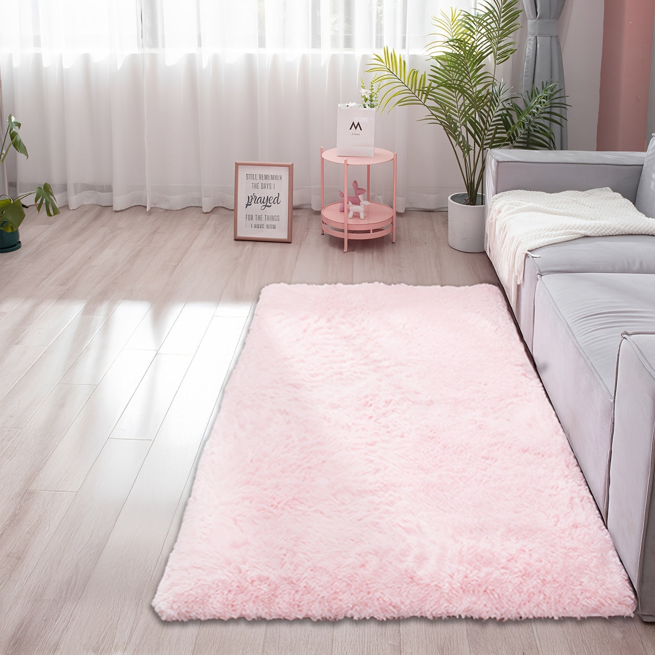 Soft and fluffy rectangle area rug perfect for your bedroom. This plush carpet is thick and non-slip, making it ideal for your living room. Made with machine-made polyester fiber, this low-pile rug is washable for easy cleaning. Perfect for indoor use.