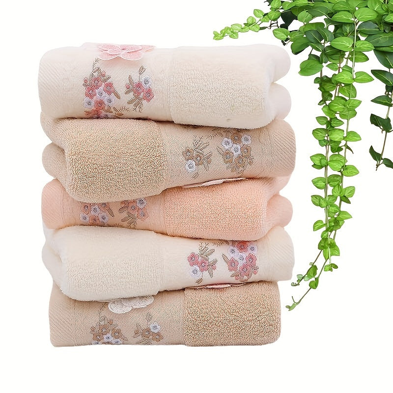 2 Cotton embroidered hand towels with quick-drying, absorbent material for home bathrooms.