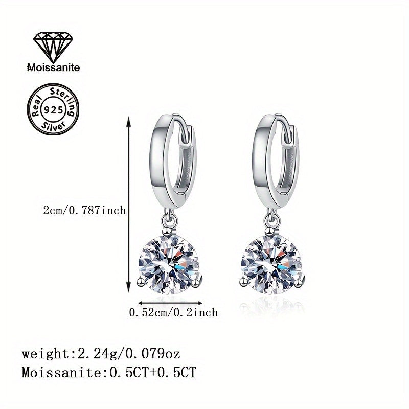 Luxurious and versatile, these 925 Silver earrings feature 1 Carat White Moissanite stones, making them the perfect gift for birthdays, Valentine's Day, Christmas, Halloween, Thanksgiving, New Year, or any special occasion. They are also great for daily