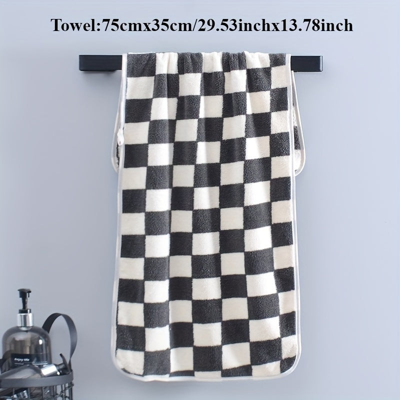 Soft skin face towel in checkerboard pattern, absorbent and comfortable for bathroom, gym, and kitchen.