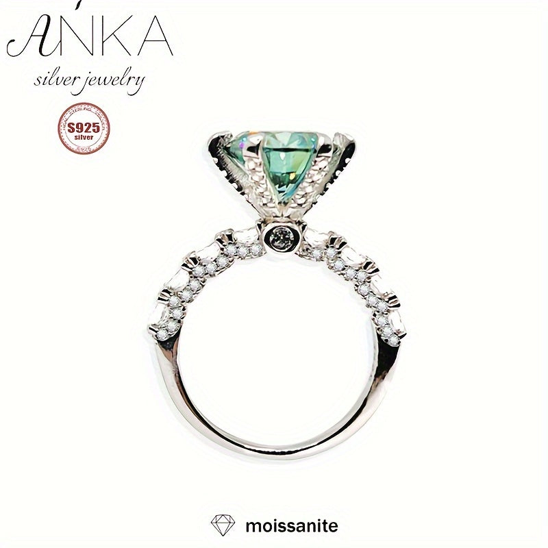 Classy S925 Sterling Silver Ring featuring a stunning 3ct Green Moissanite stone, perfect for engagements or as a luxurious gift. The band is embellished with non-plated Moissanite stones, making it suitable for all seasons. Available in sizes 3.3-3.5g.