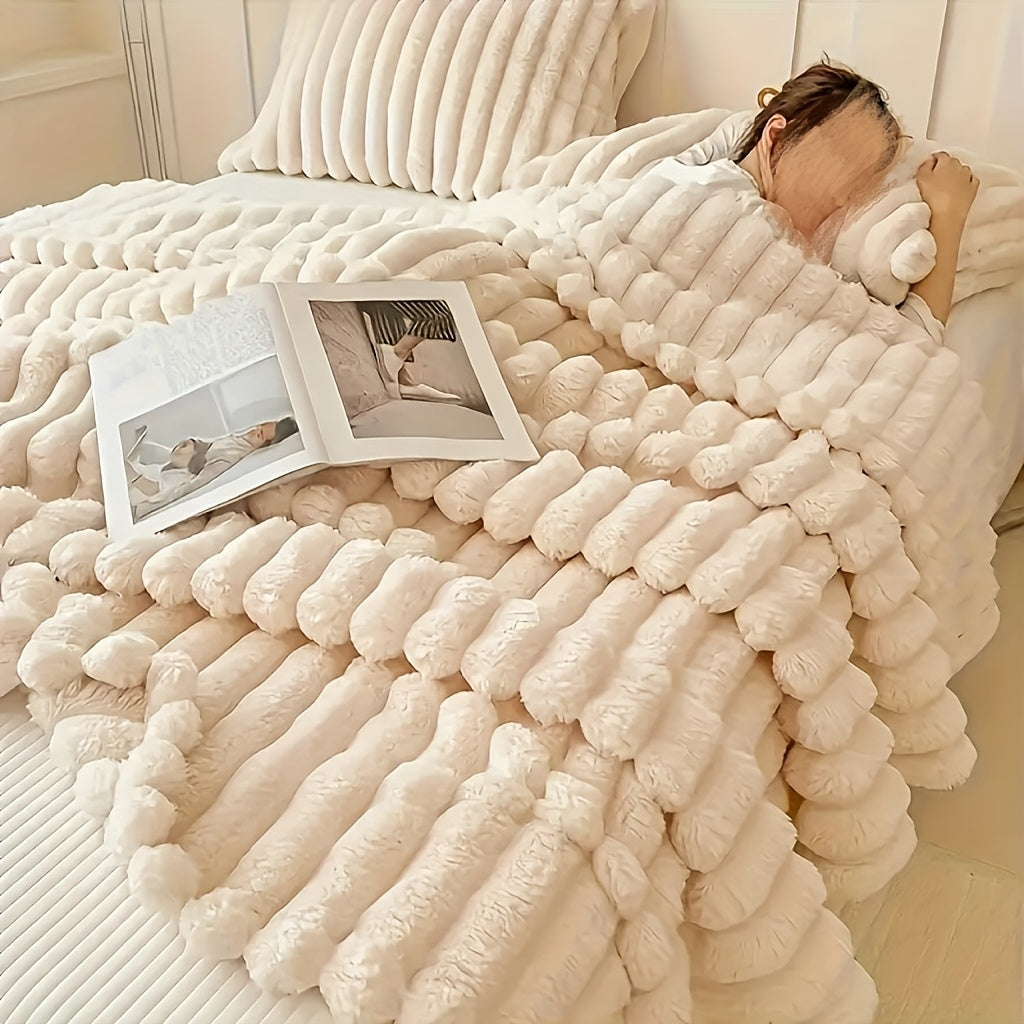 Indulge in the comfort of our luxurious plush blanket - a cozy fleece throw that will keep you warm and snuggled up on the sofa. This soft and insulating blanket is not only perfect for lounging, but also machine washable for easy care. Its modern style