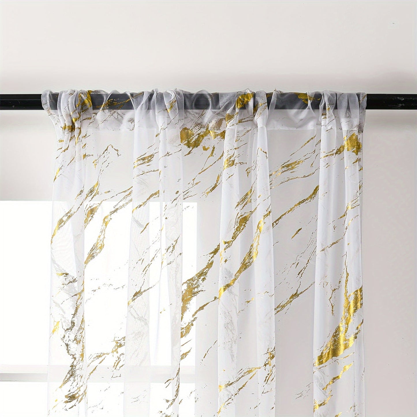 Elegant sheer curtains featuring a marble pattern print, perfect for enhancing the decor of living rooms, bedrooms, and office windows.