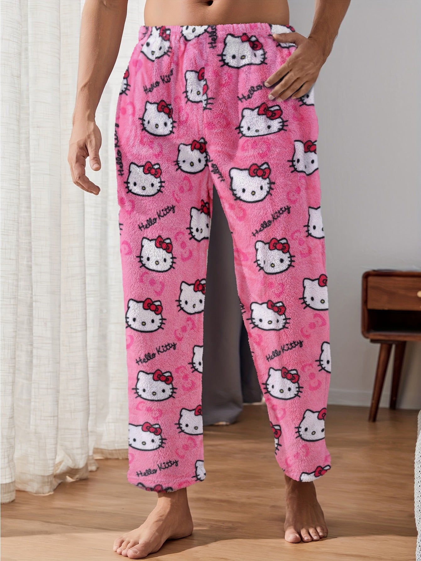 New men's flannel pajama pants for autumn and winter, featuring a cute KT print. Keep warm and stylish while at home.