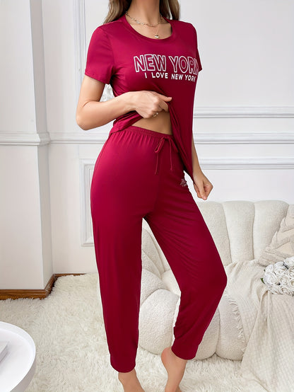 Slogan print pajama set for women, including short sleeve t-shirt and drawstring joggers.