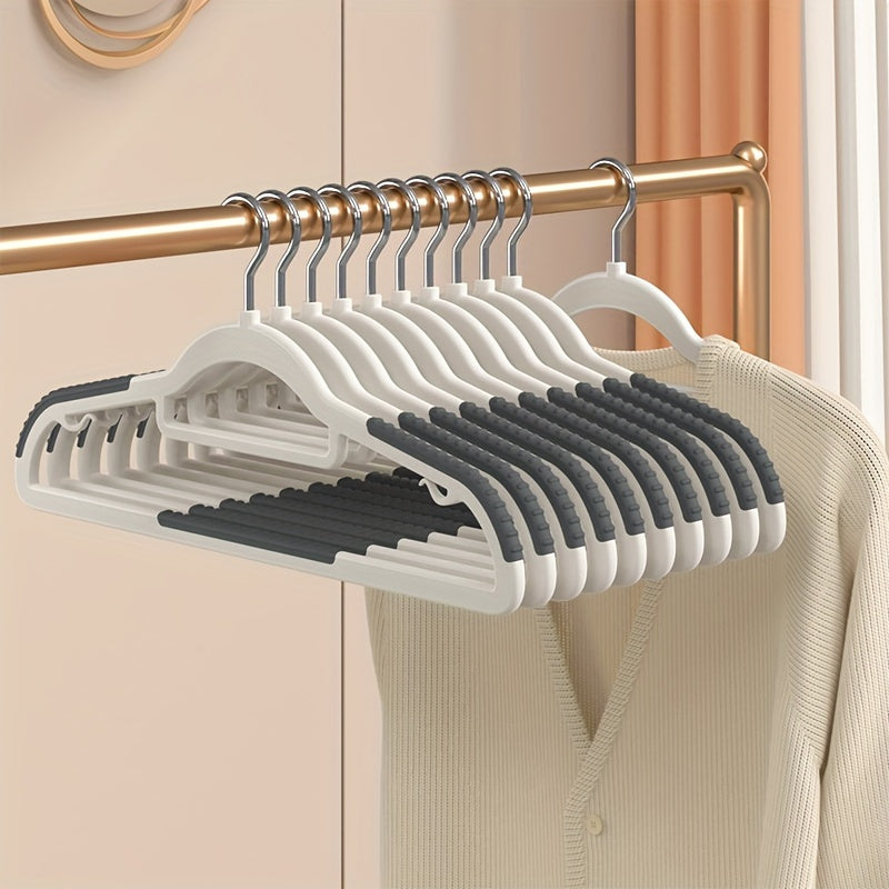 10 non-slip heavy duty clothes hangers for storage and organization in bedroom, bathroom, and home.