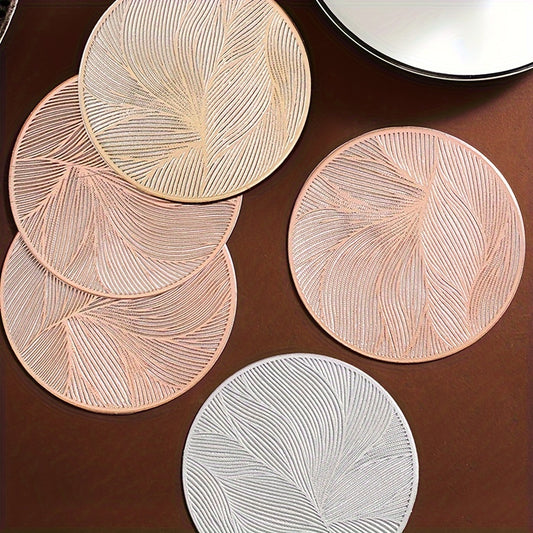 6 PVC round place mats with leaf pattern, heat resistant and non-slip. Hand wash only. Perfect for dining, weddings, and holiday decor.