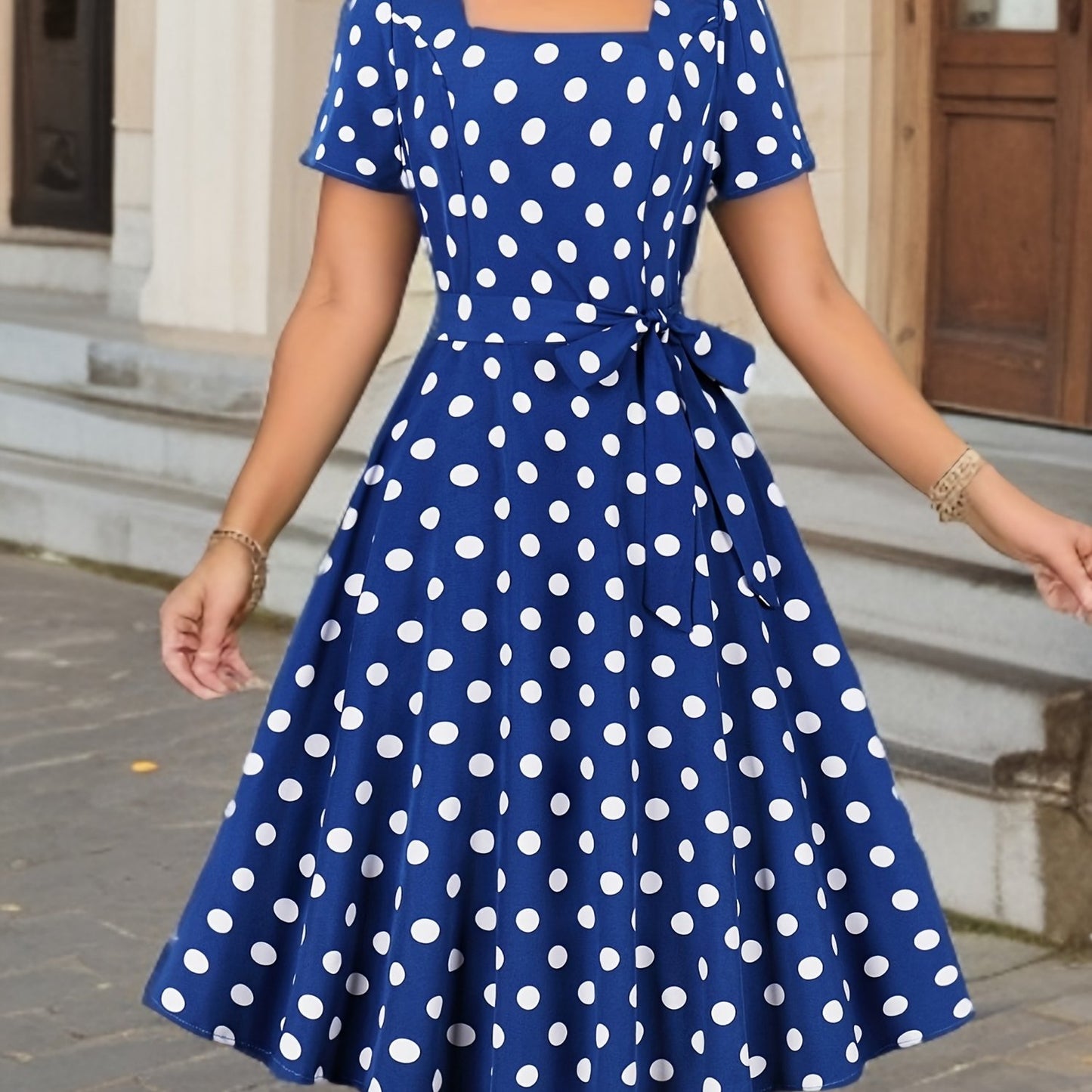 Polka dot print square neck dress with short sleeves and belt, perfect for spring and summer.