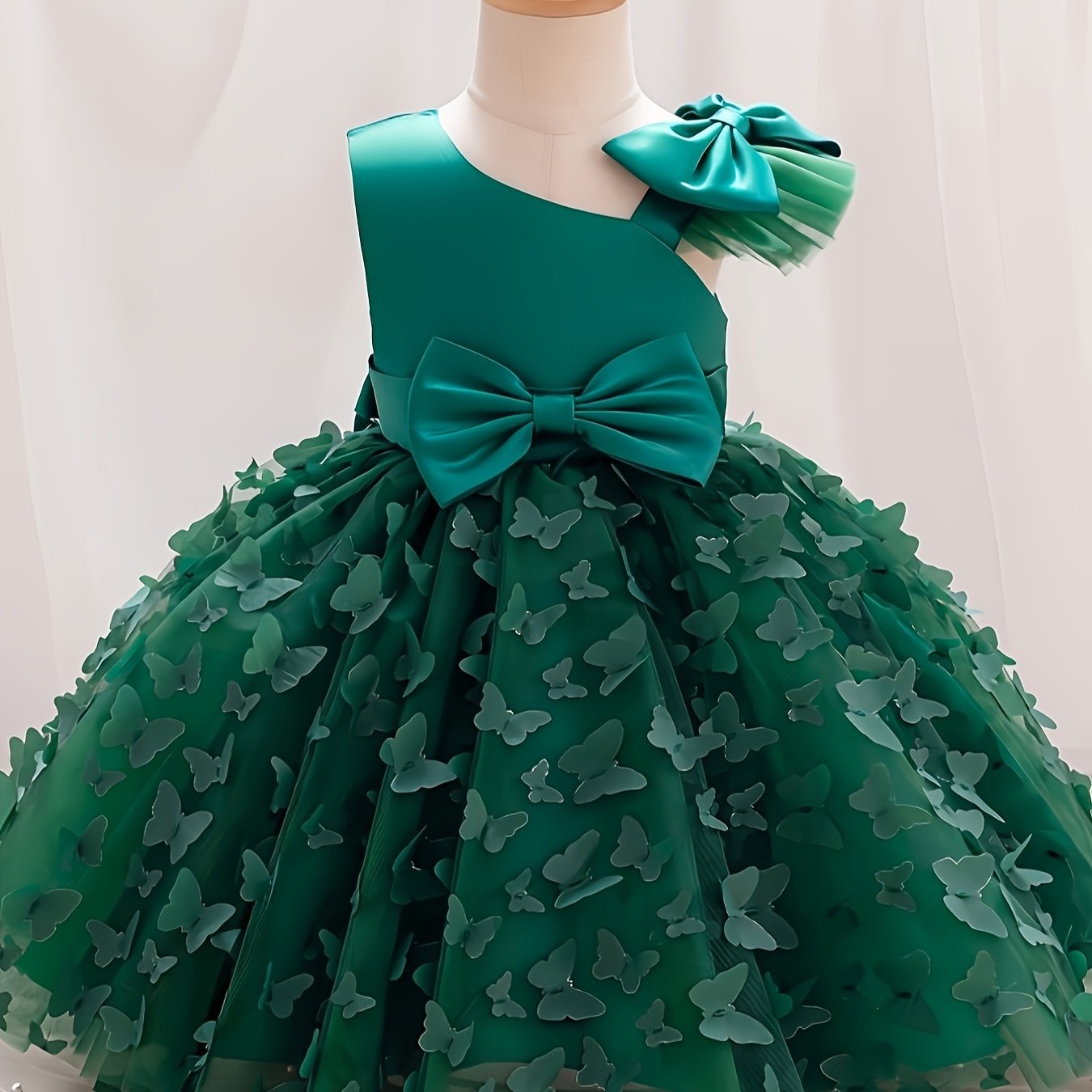 Toddler girls princess dress with butterfly design, bow belt, and flutter mesh sleeves, perfect for parties and birthdays.