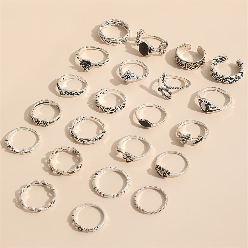 A collection of 22 vintage-inspired oil drop gossip snake eye rose carved joint rings suitable for both men and women.