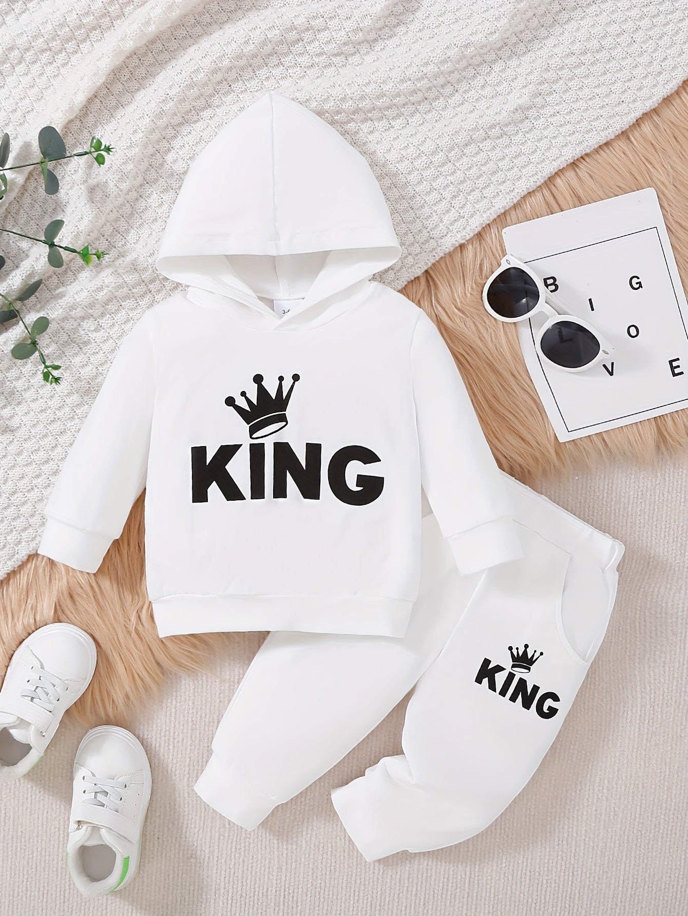 Baby boy's casual outfit set with hooded sweatshirt featuring KING print and matching pants.