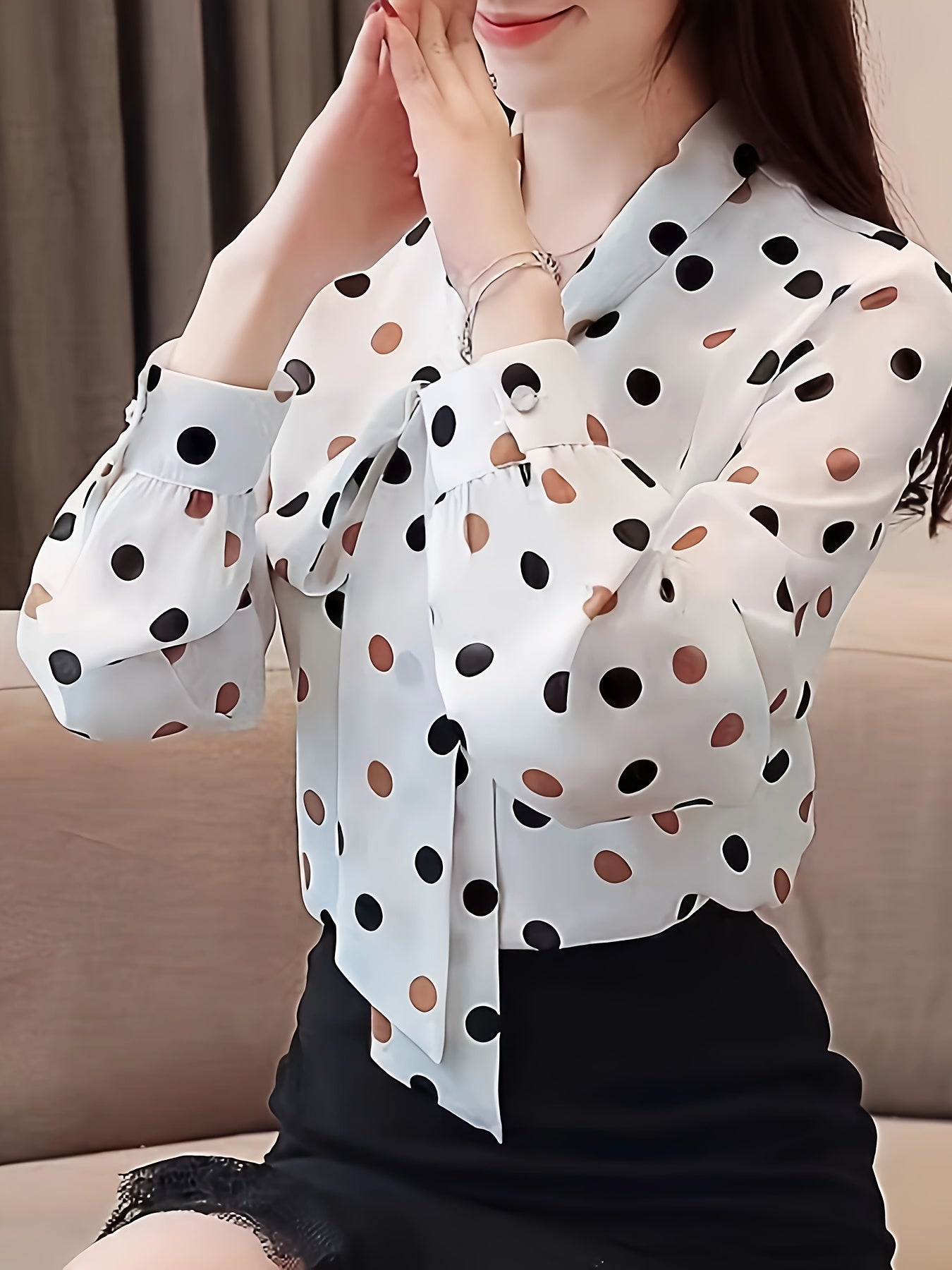 Women's elegant floral print blouse with tie-neck design, perfect for spring and summer fashion, made of lightweight polyester with semi-sheer finish and glossy look.