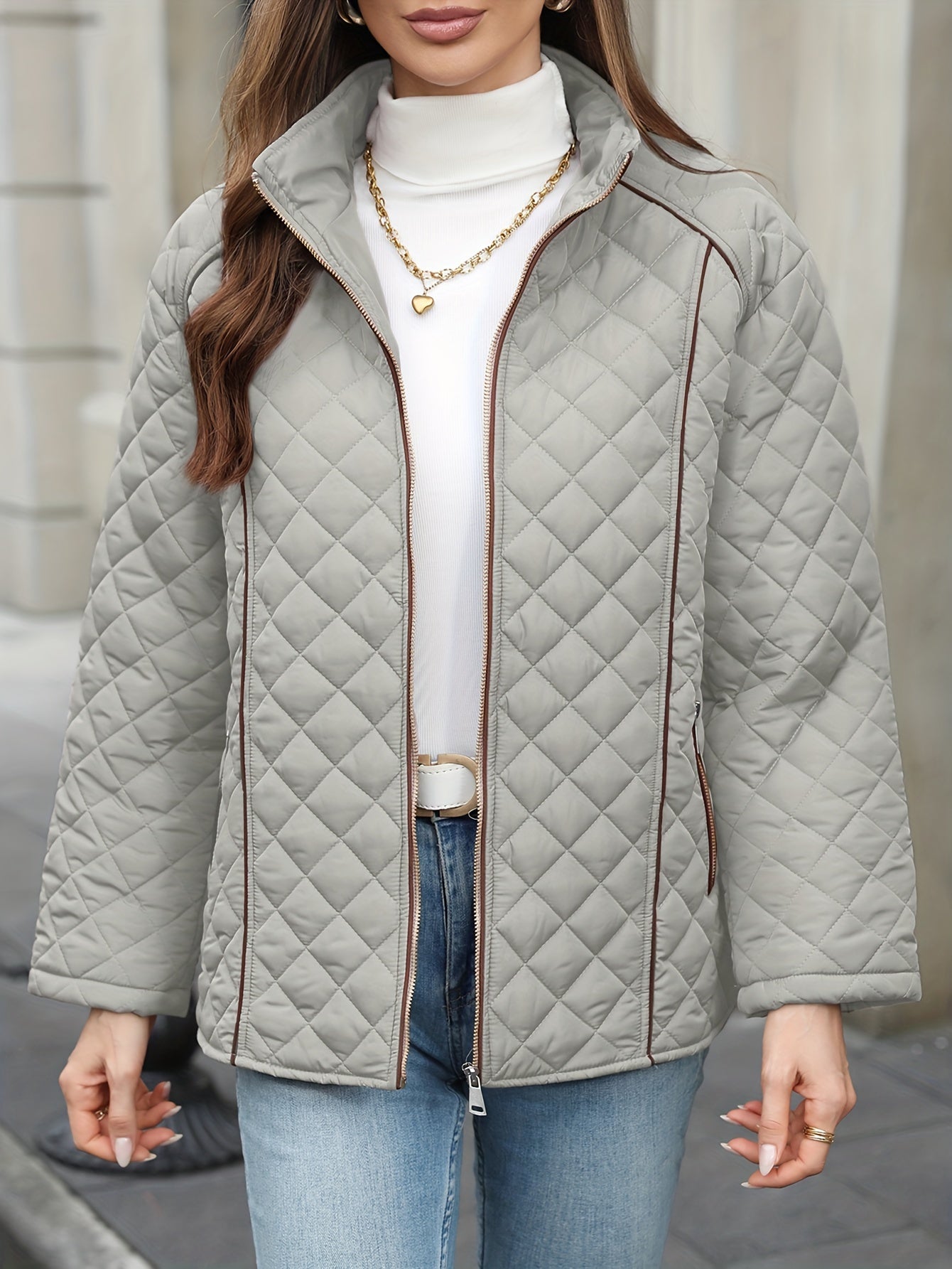 Women's plus size quilted jacket with zipper closure, polyester material, long sleeves, solid color, autumn/winter outerwear.