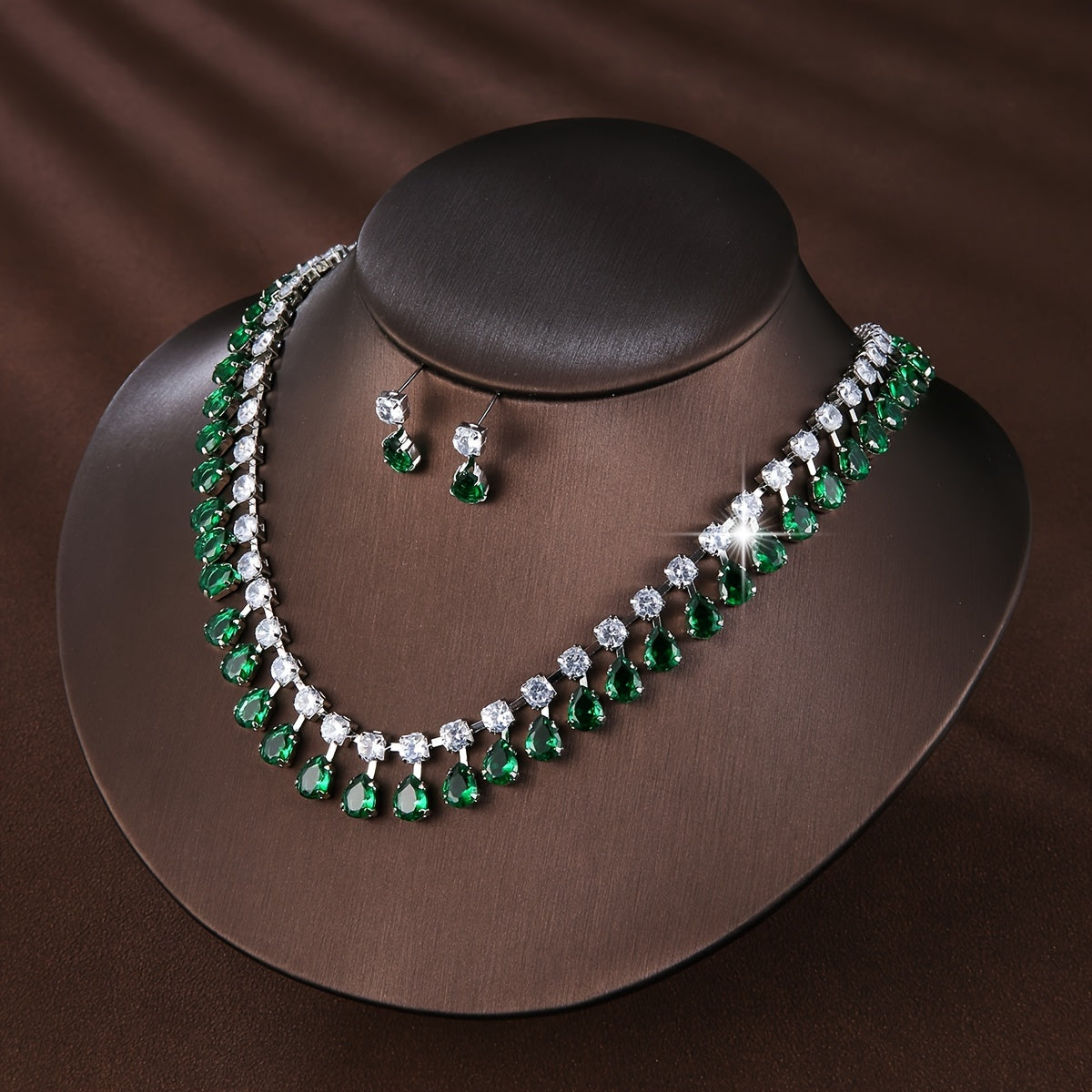 New European and American style set of three elegant jewelry pieces for ladies, including earrings and necklace adorned with luxurious zirconia. Perfect for bridal wedding events or formal banquets, this set is both fashionable and chic.