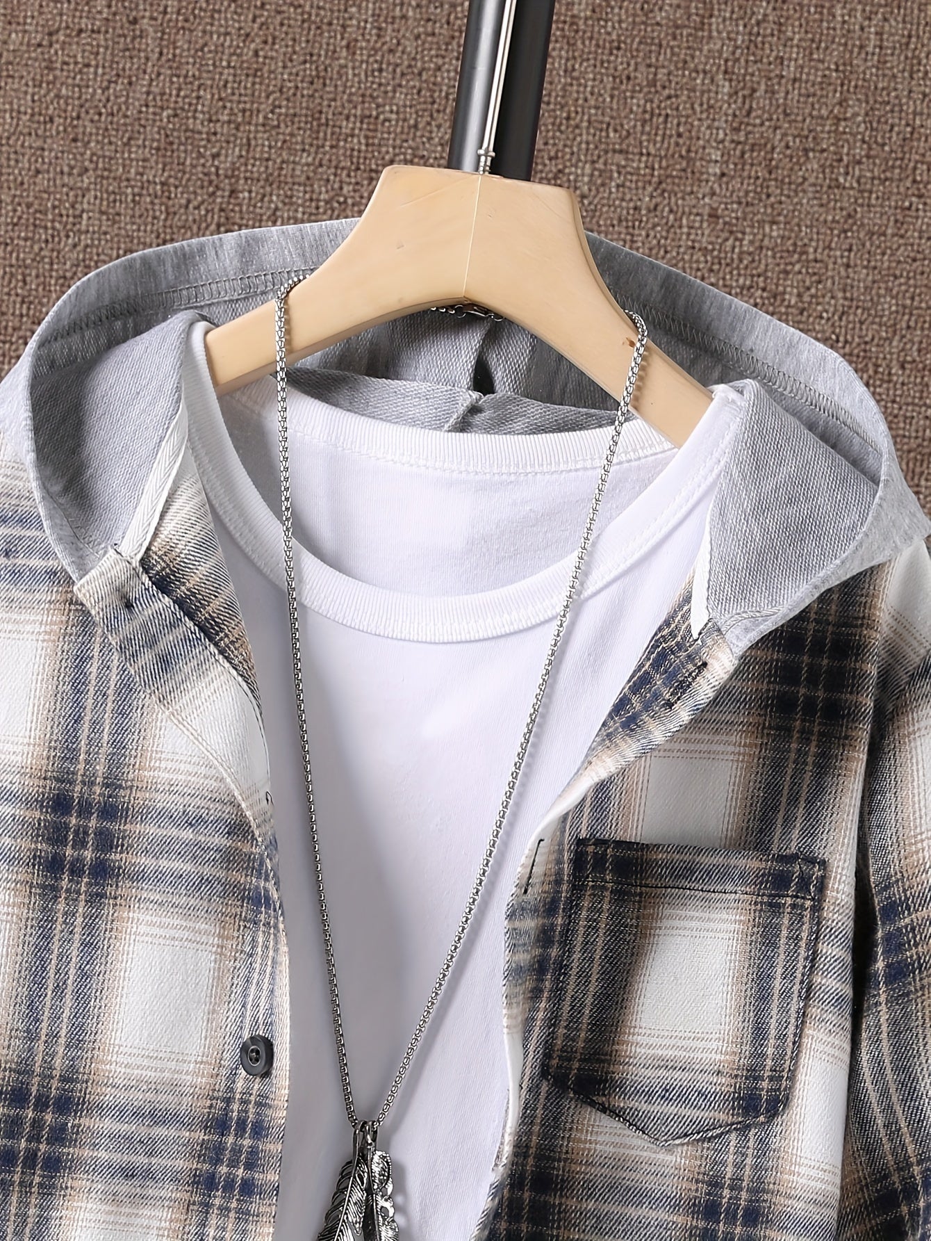 Plaid hooded shirt for boys in cozy knit fabric with pockets, regular fit and slight stretch, perfect for fall/winter season.