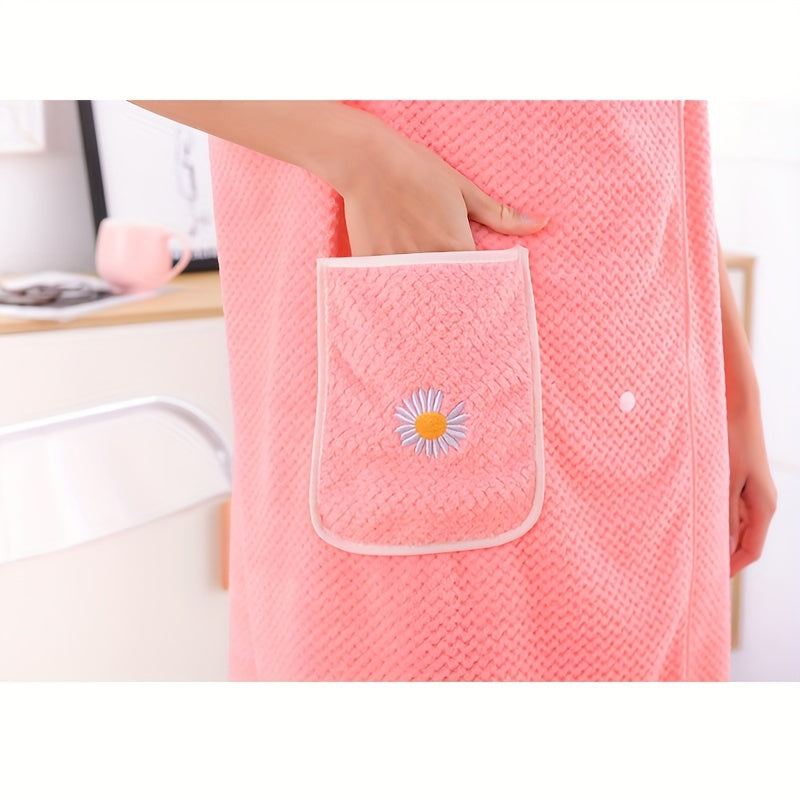 Absorbent wearable bath towel with pocket for women, ideal for bathroom spa use.