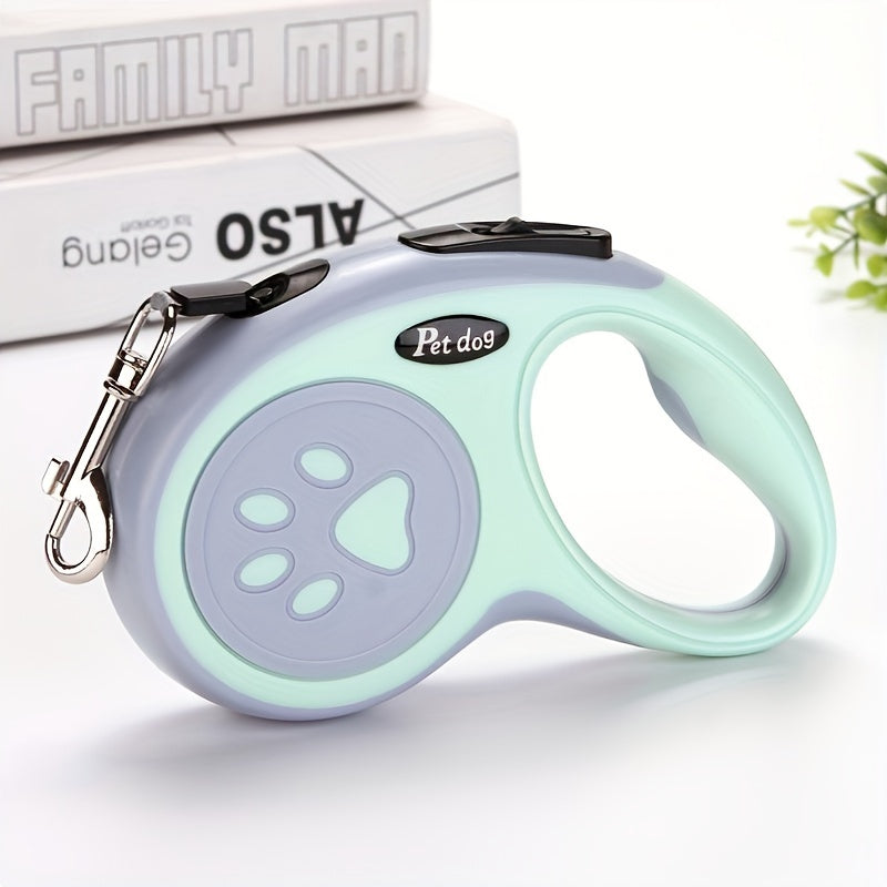 Durable polyester retractable dog leash featuring paw print design, ideal for dogs. Easy to use and store.