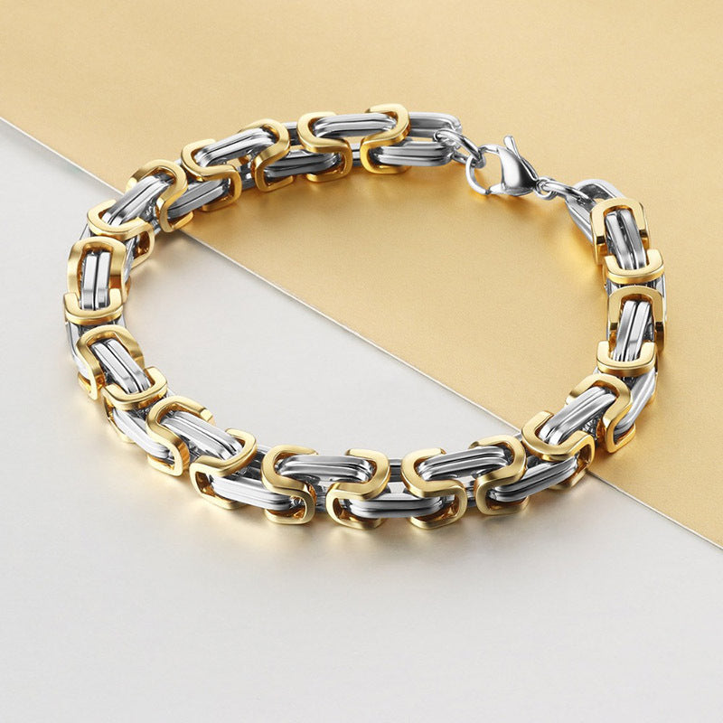 Stylish men's stainless steel chain bracelet in 8mm width, featuring a sturdy Byzantine box chain design. Available in black, golden, or silvery colors, this hip hop inspired bracelet is the perfect accessory for men looking to add some flair to their