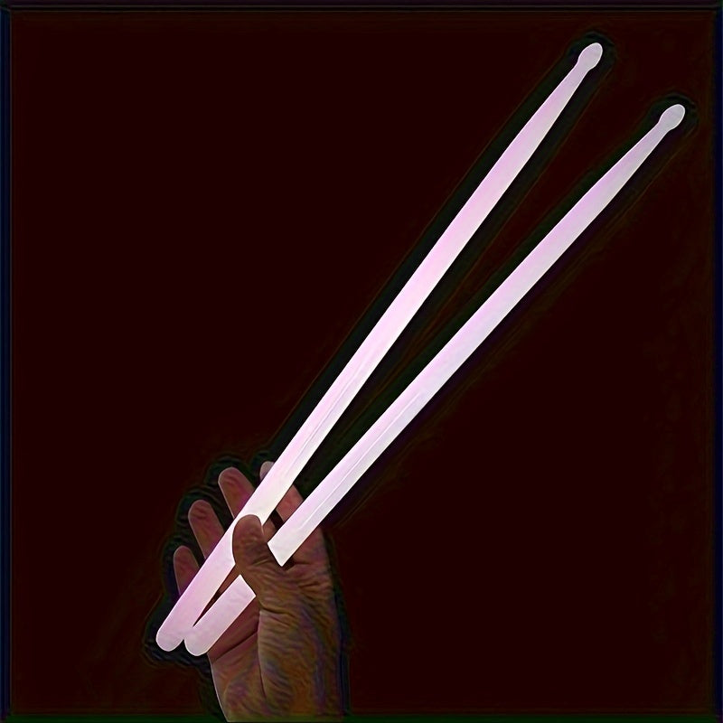 Jazz drumming drumsticks that continuously glow in the dark.