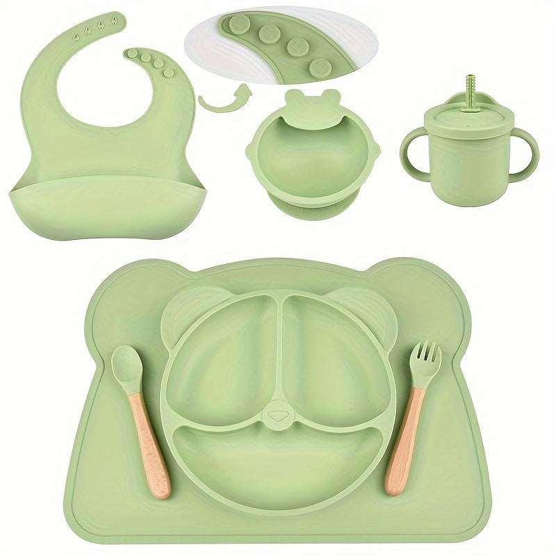 7-piece toddler meal set with silicone utensils in mixed colors, featuring cartoon design and high suction power. Easy to clean and includes placemat, plate, bowl, spoon, fork, bib, and