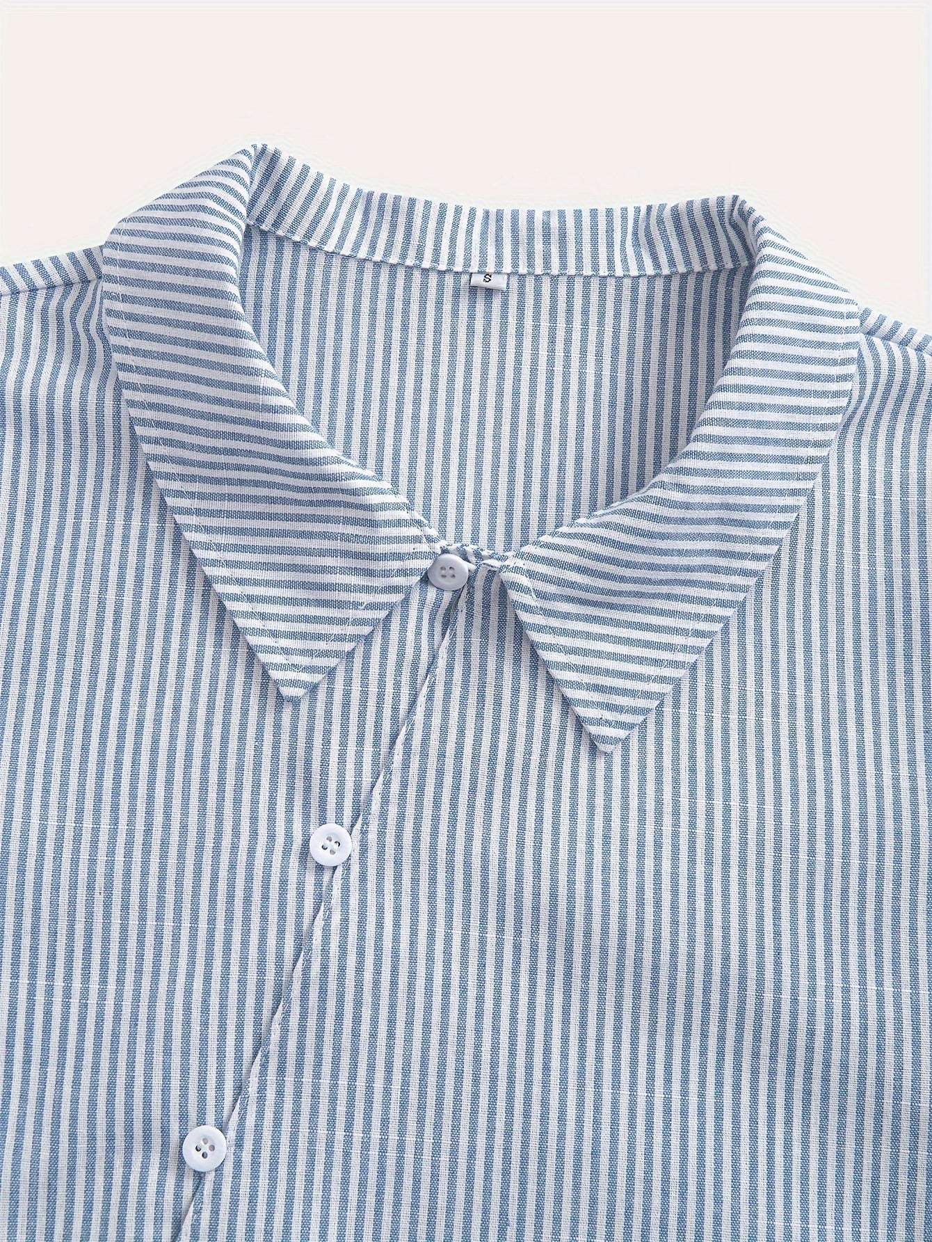 Casual striped cotton shirt for women with lapel collar, loose fit, and button front. Perfect for all seasons.