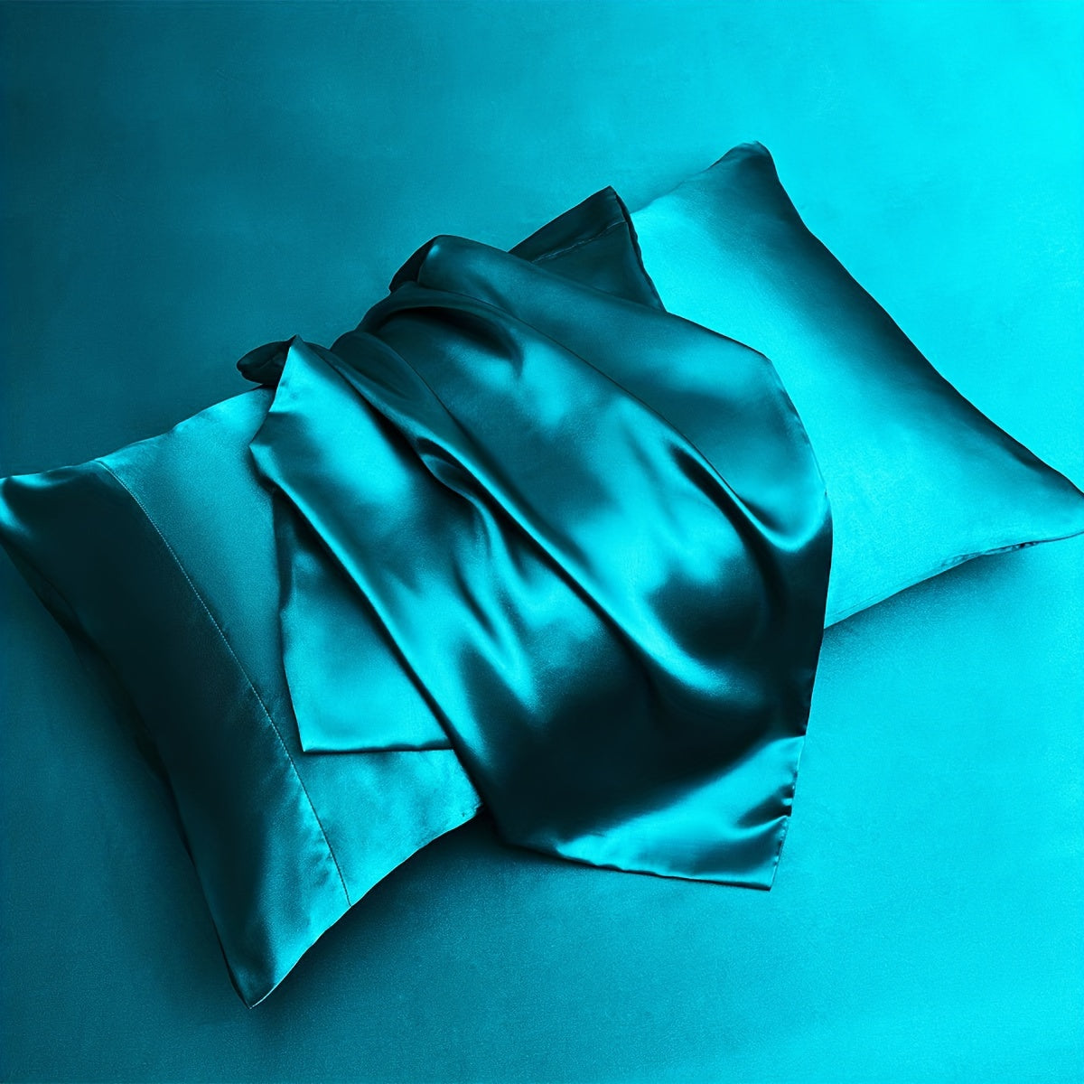 Two pieces of satin pillowcases available in solid colors perfect for the living room or bedroom. Pillow inserts are not included.