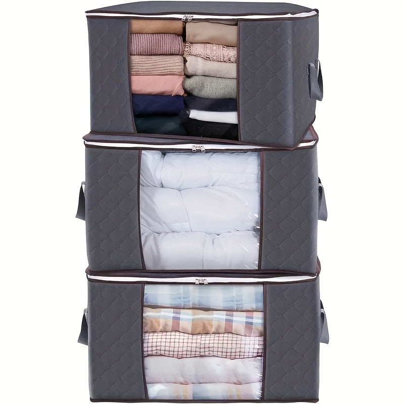 Three 90L storage bags with reinforced handles for organizing clothing, blankets, toys, and bedding in a bedroom wardrobe.