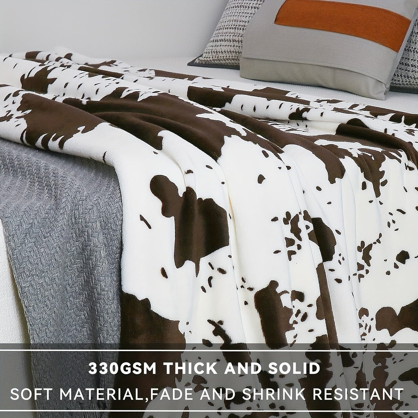 Soft and lightweight, this plush flannel blanket in a cozy cow print is made of 100% polyester for all-season comfort. Perfect for snuggling on the couch or taking on travel adventures, its adorable brown and white design adds a touch of charm to any