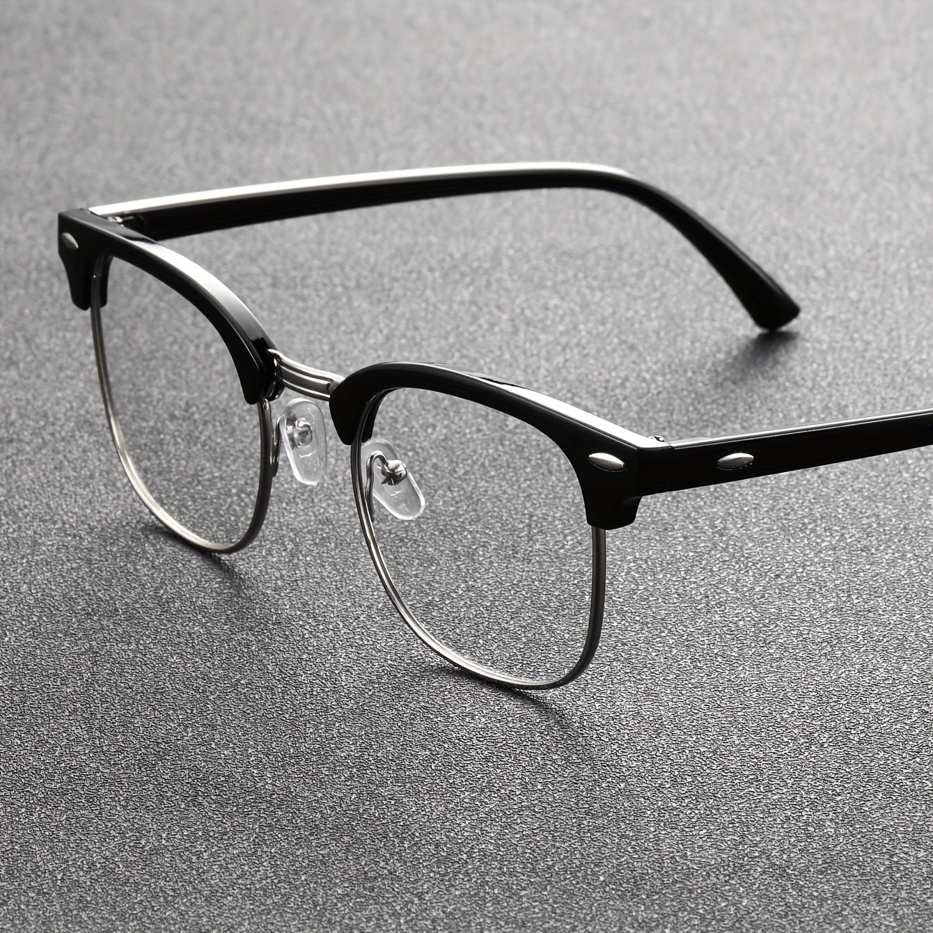 Men's classic fashion glasses in black semi-rimless style with TAC lenses, casual design, metallic accents, suitable for everyday use and stylish frame with comfortable fit.