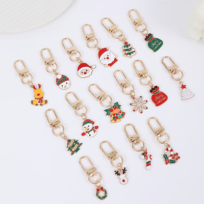 [Top Pick] Set of 16 Christmas-Themed Keychains featuring adorable Cartoon Alloy Metal designs of Santa, Reindeer, Snowflakes, Candy Canes, Bells, and Snowman.