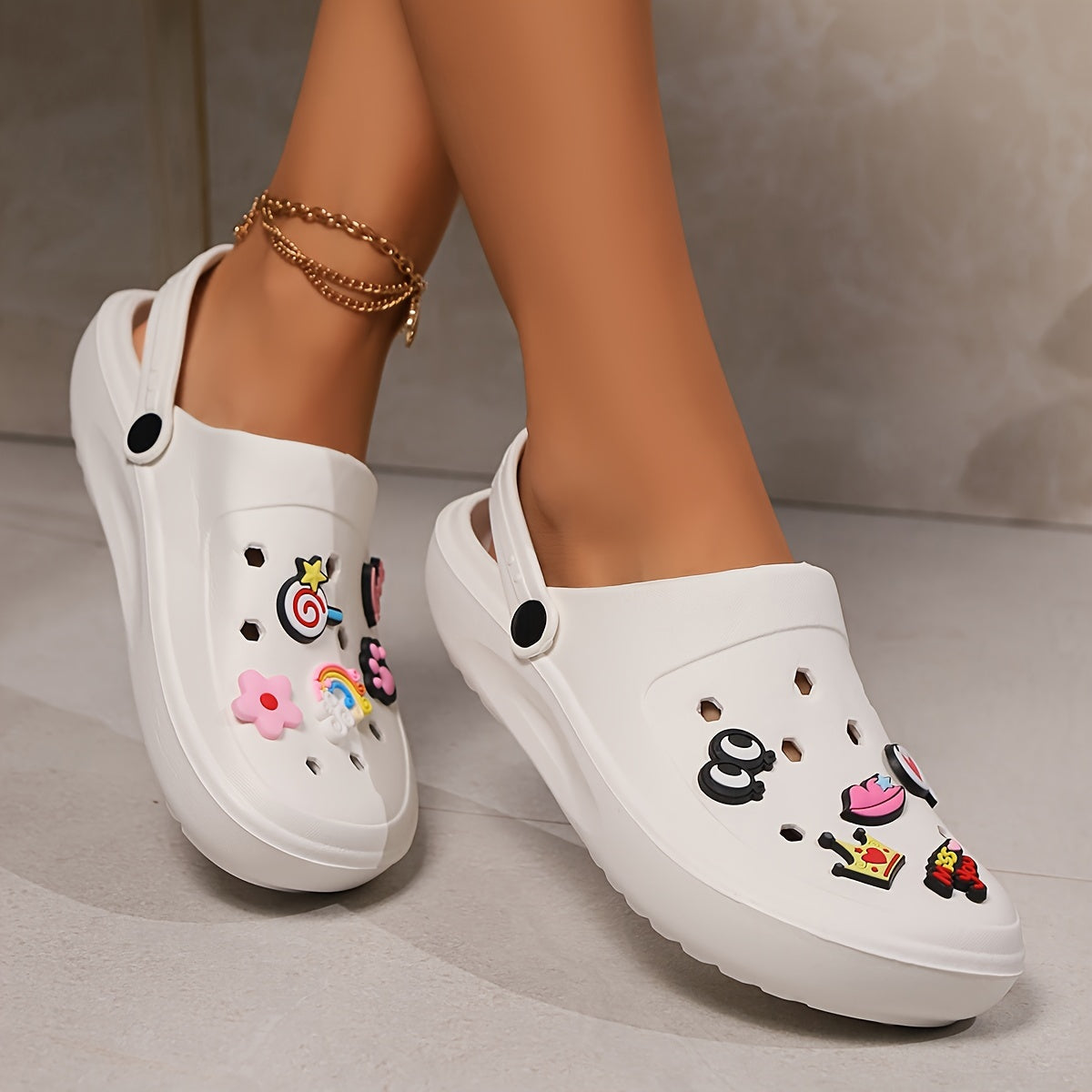 Elegant summer clogs for women - breathable beach sandals with thick soles and charm detail, versatile slip-on shoes for outdoor wear.