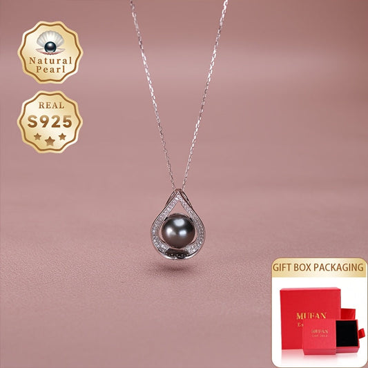 Vintage-inspired, this elegant black natural pearl necklace is crafted from 925 sterling silver. A perfect gift for her, each necklace boasts a unique pattern and color variation. Presented in a box set, this piece features a Tahitian pearl with shape