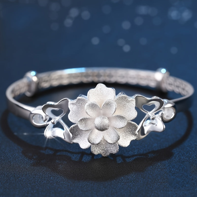 Sterling Silver Flower Bracelet made from S999 silver, features an adjustable design that is both fashionable and versatile. This noble fashion bracelet is a perfect gift for lovers, mothers, daughters, and as party, Valentine's Day, or Christmas gifts.