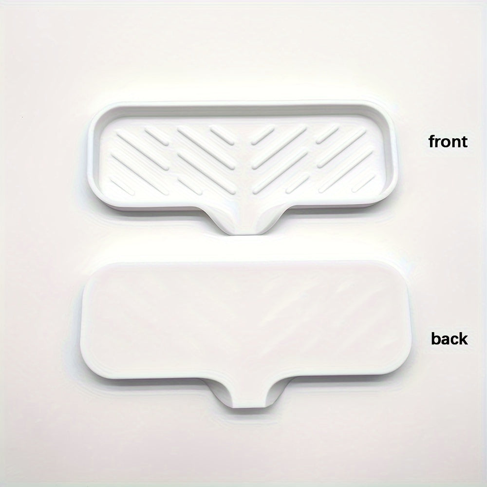 Silicone soap dish with self-draining tray for kitchen or bathroom sink, also functions as a non-slip sponge holder and soap saver pad.