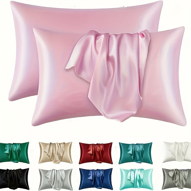 Two luxurious silky soft pillowcases with breathable and skin-friendly cooling feel. Solid color with envelope closure. Machine washable. Set of two.