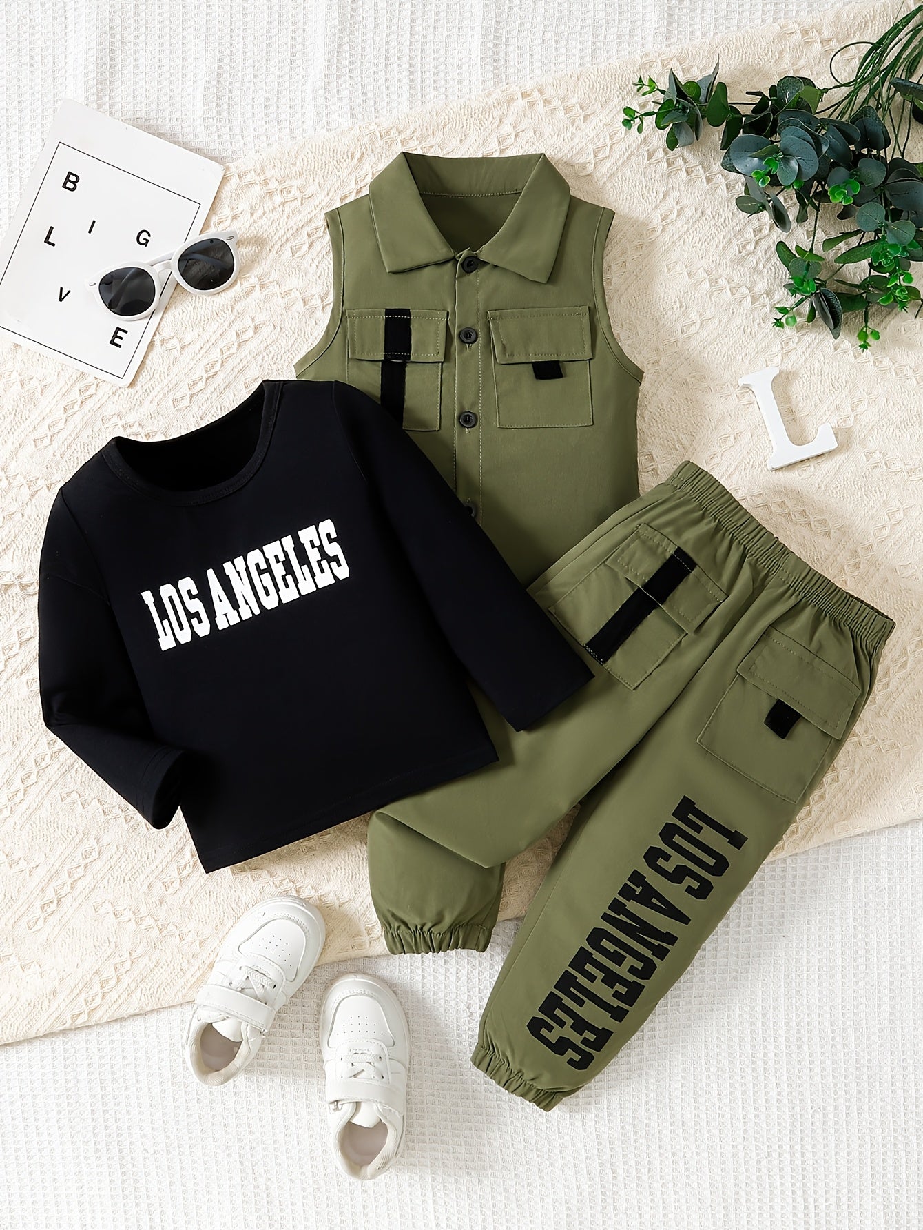 Boys' 3-piece casual outfit set made of cotton blend material. Includes long sleeve shirt, vest, and pants with button details and slight stretch. Suitable for spring/fall season, regular