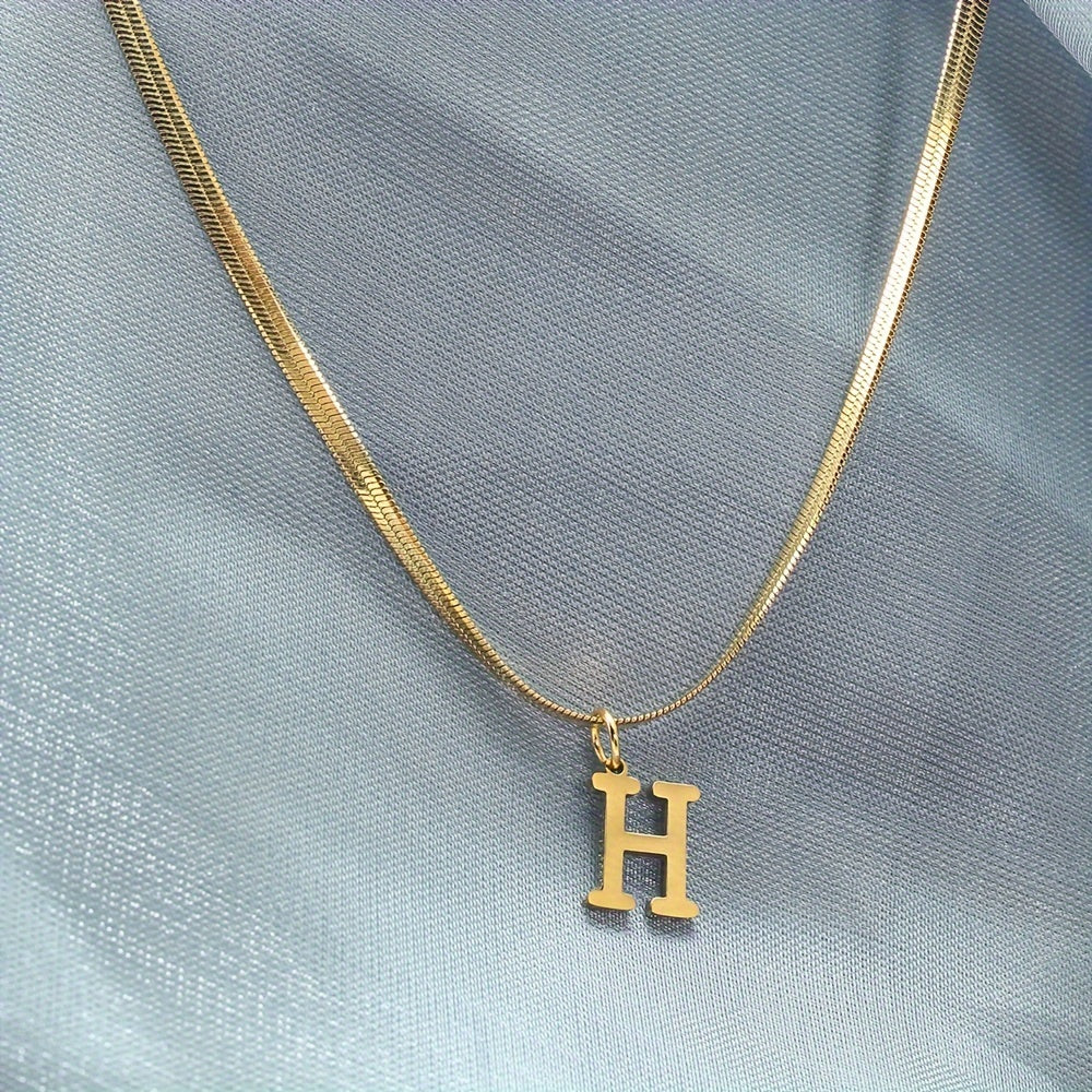 26 alphabet letter pendant chains, 18K golden plated stainless steel necklaces for women, perfect for everyday wear and gifting, featuring a versatile and elegant design.