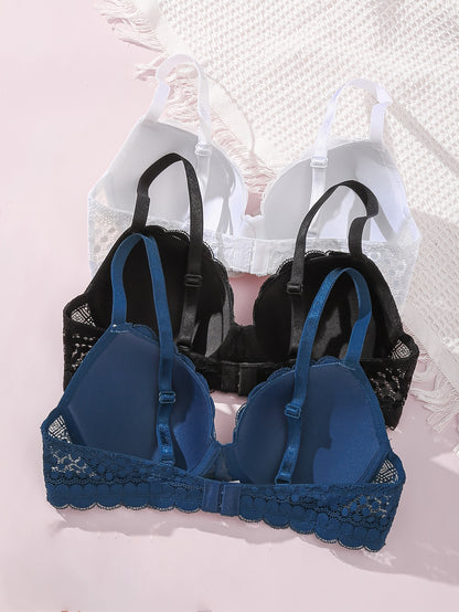 Set of 3 Elegant Lace Push-Up Bras for Women in White, Black, and Navy Blue. Sexy, Comfortable, and Breathable with Non-Removable Pads. Perfect for a Sensual and Smooth Lingerie Look.