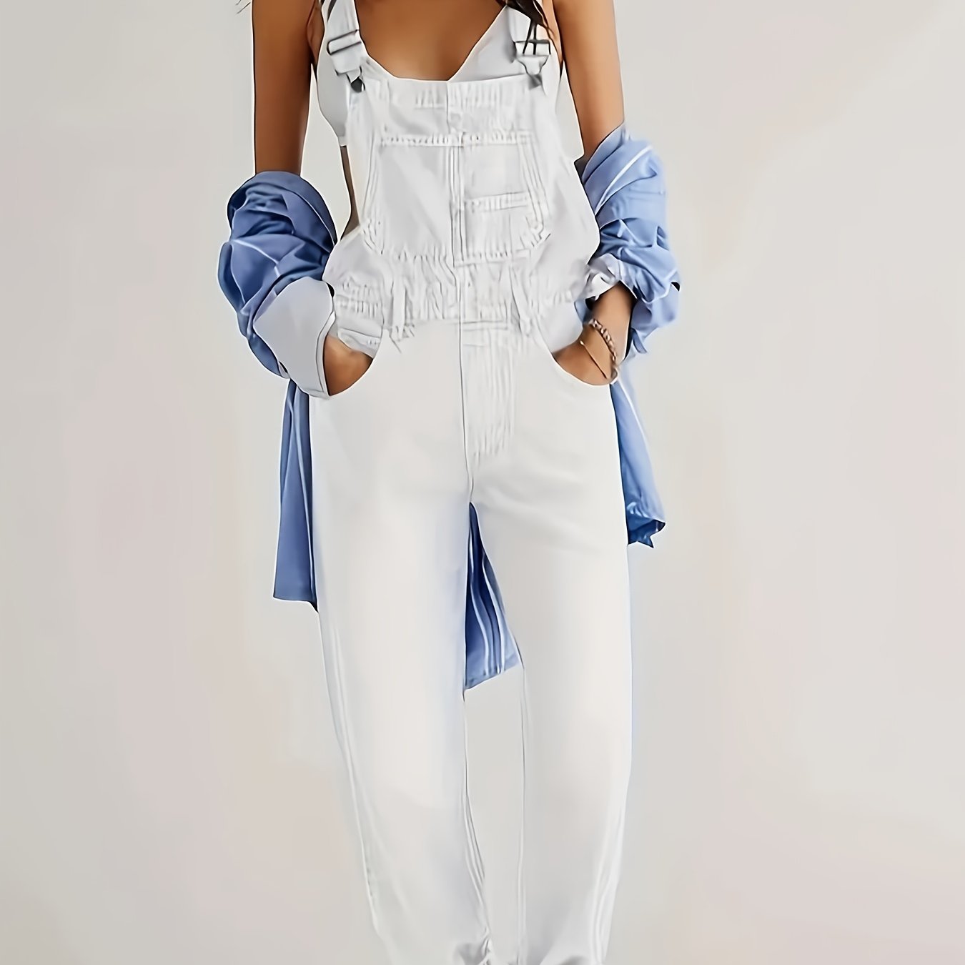 Casual solid color denim overalls for women, made of viscose and polyester blend fabric, strappy back design, no belt included, regular fit.