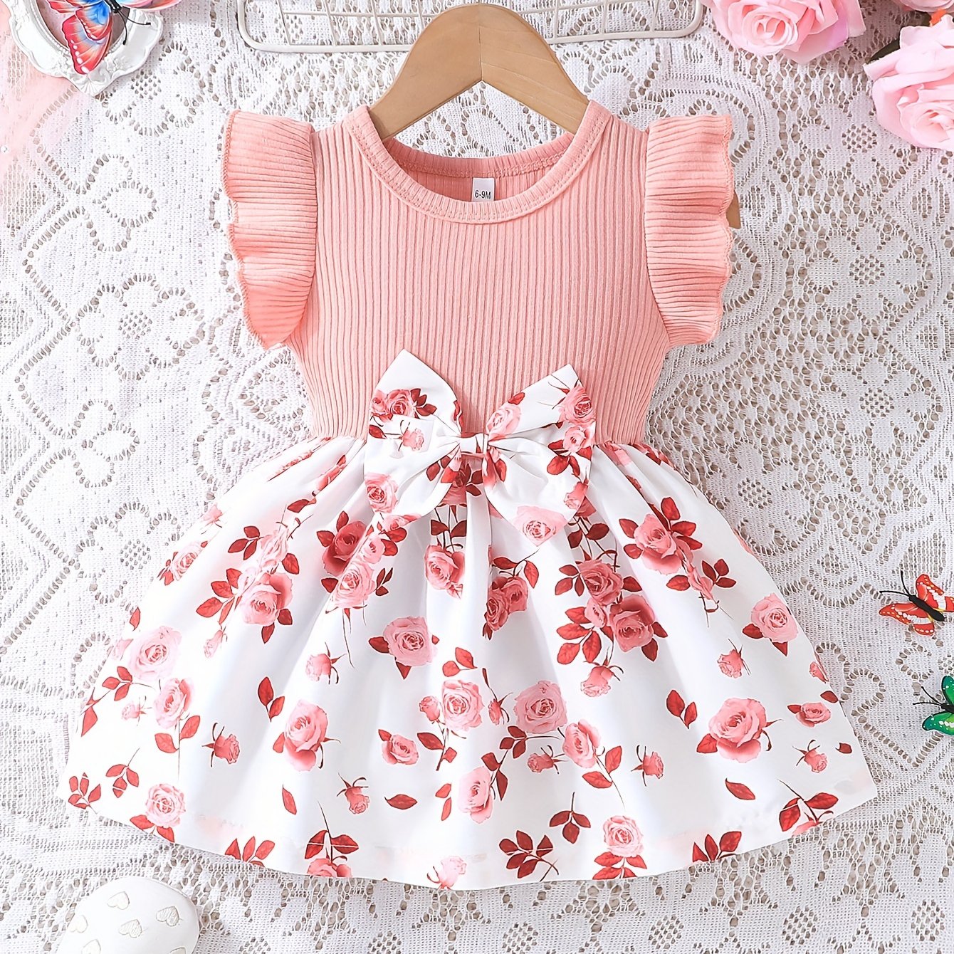 Baby girl's elegant summer dress set with romantic rose design and bow detail