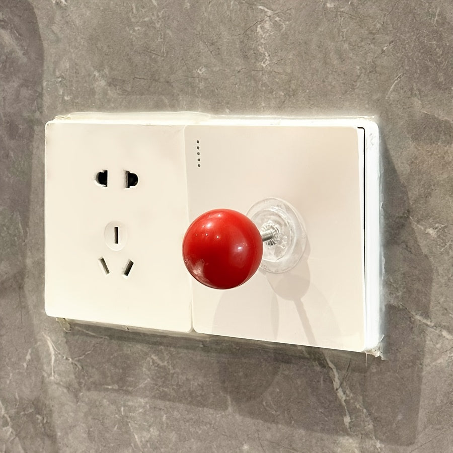 Modern lever ball switch sticker for light switch, drawer handle, toilet pusher - no battery needed, easy stick-on design.