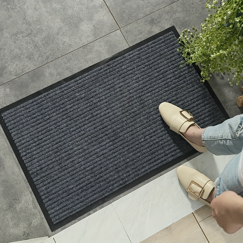 The Striped Entrance Mat is made to last, featuring a durable design that is perfect for both indoor and outdoor use. This non-slip mat is easy to clean and fade-resistant, making it a great addition to any entryway, courtyard, or indoor space. Welcome