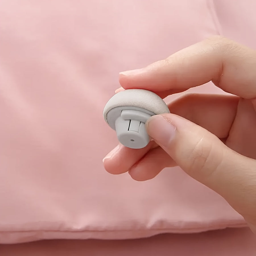 Ensure a comfortable sleep with our 4-Pack Mushroom Shaped Duvet Clips. These clips feature an easy one-key unlock system for quick assembly, invisible design for sleek styling, and are made with pure fabric for a luxurious feel. Spot-clean care makes