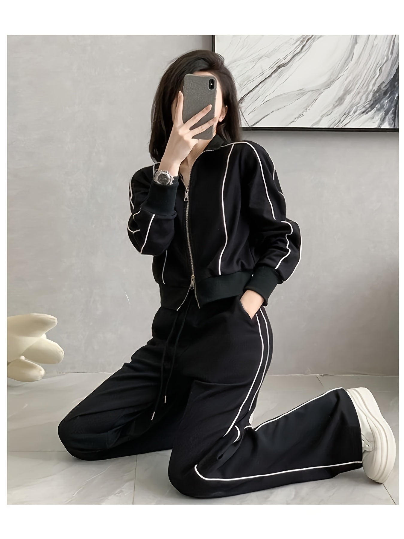 Women's zip-up cardigan and high-waist wide-leg pants set in black, perfect for casual wear. Made from a polyester blend with long sleeves, solid color, and a high-grade European and