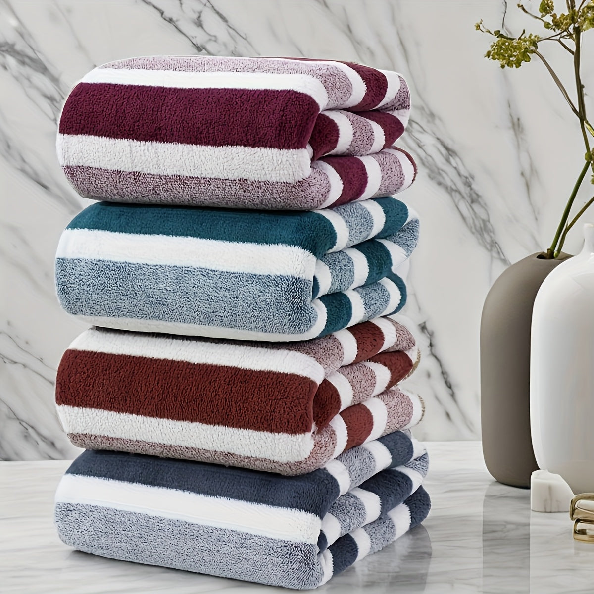 Set of 4 space-themed microfiber bath towels, highly absorbent, durable and made of 80% polyester and 20% nylon. Each towel measures 69.85cm x 139.7cm, perfect for a year's use. Includes wash cloths.