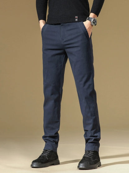 Men's slim fit denim jeans, perfect for outdoor casual wear.