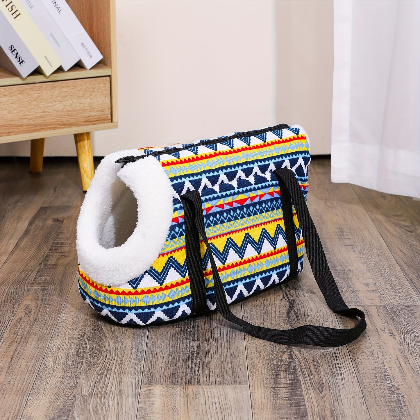 Washable, portable cat carrier bag in multi-colored design, perfect for small to medium cats. Features zippered closure and disassembled for easy litter outings.